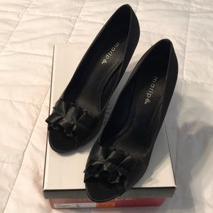 New  Maripe black satin peep toe pumps.